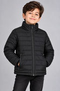 Young boy wearing black lightweight quilted puffer jacket front view with zip closure