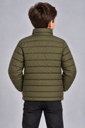 Young boy wearing olive green horizontal quilted winter puffer jacket back view