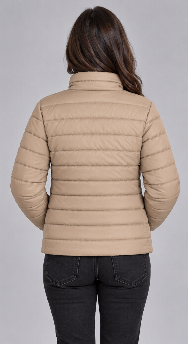 Woman wearing khaki beige horizontal quilted winter puffer jacket clean back view